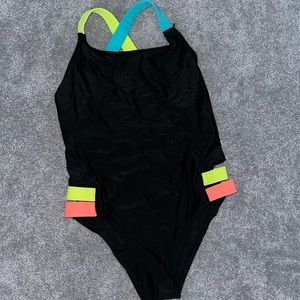 One piece bathing suit. Open side design. Size small.